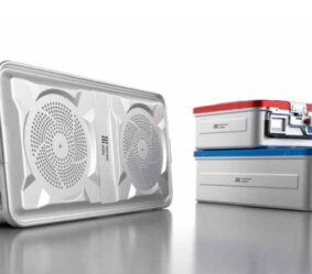 White portable refrigeration units: a large open case with two visible fans on the left and two compact coolers stacked on the right (red and blue lids).